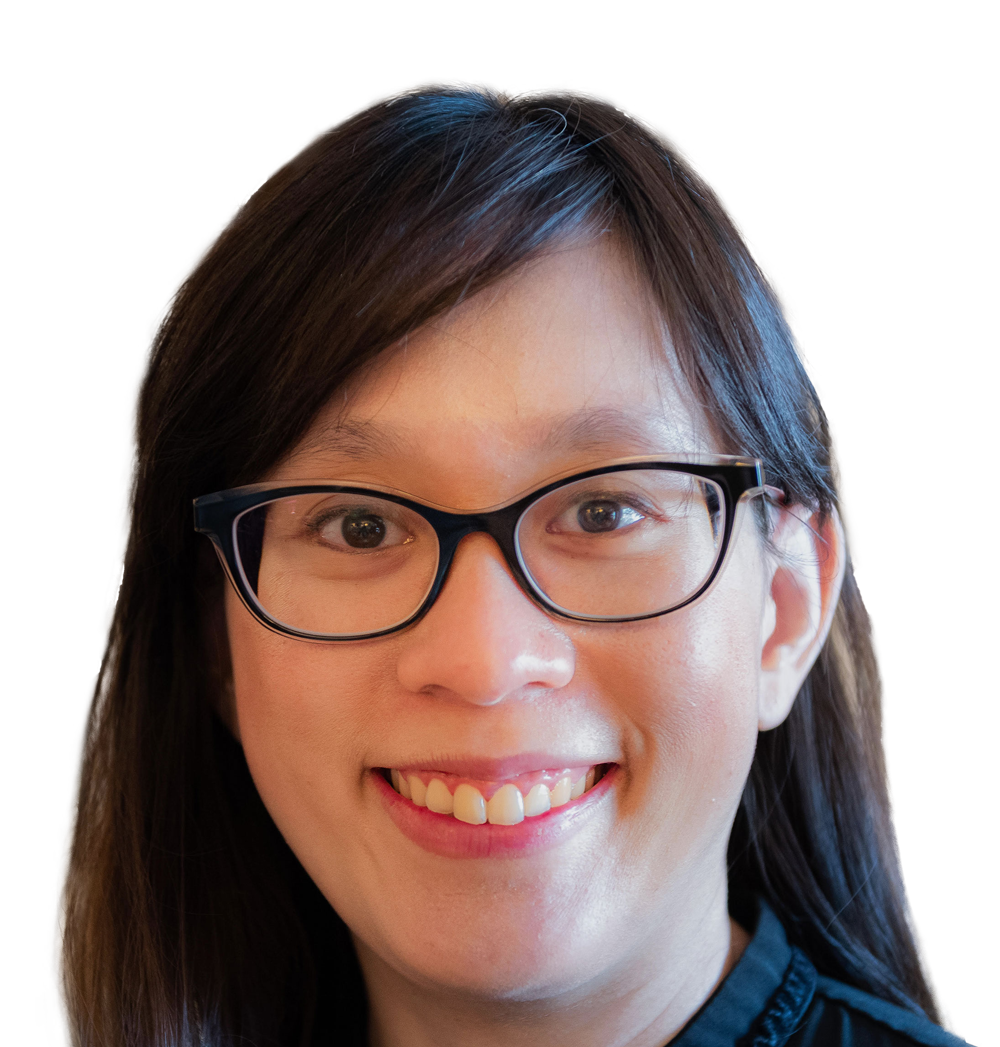 A woman smiles. She is Asian with long brown hair, oval shaped glasses with black rims, and dark brown eyes. She is a Fertility Specialist in New South Wales.